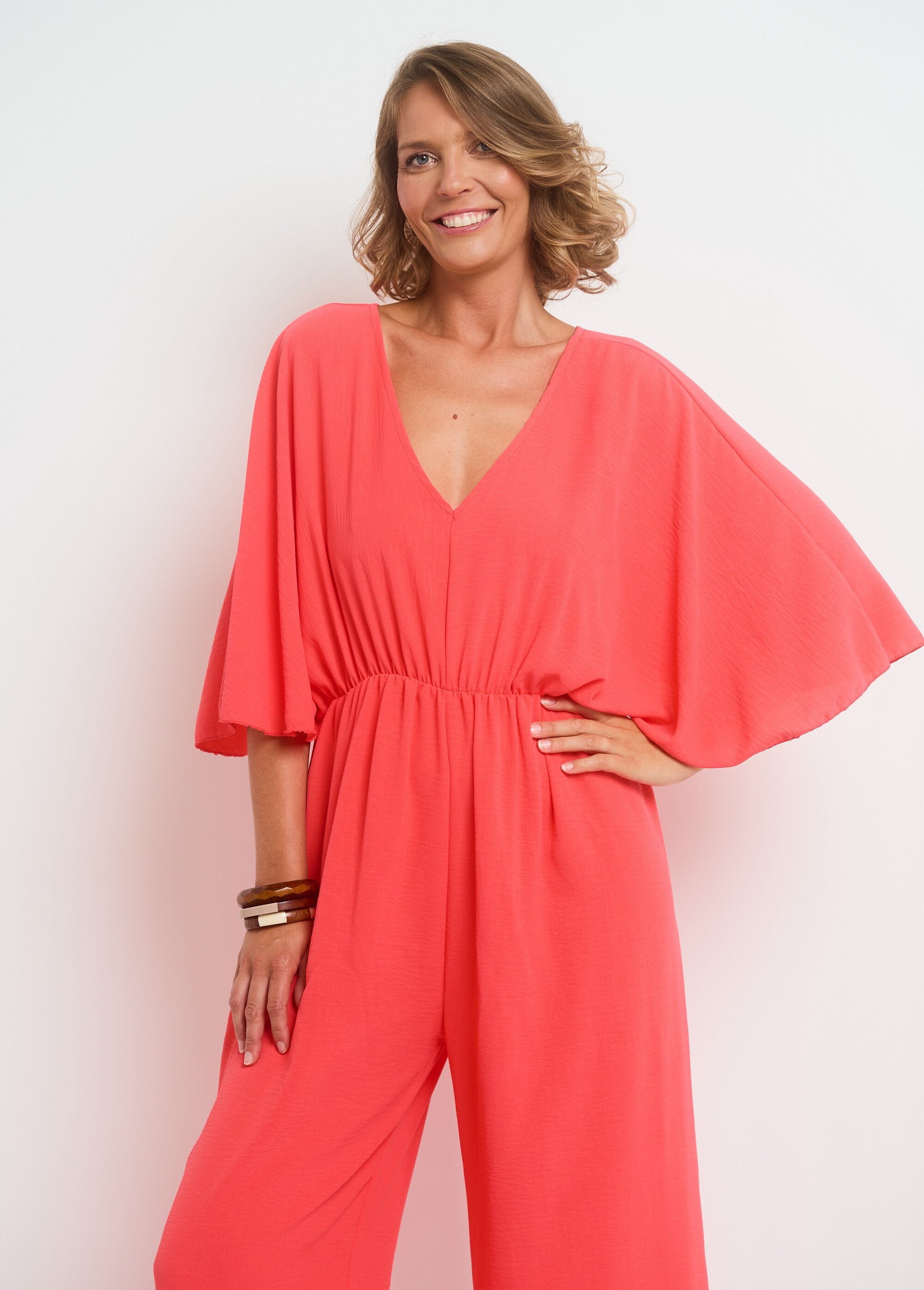 Fluid_V-neck_jumpsuit_with_tie_back_Coral_DE1_slim